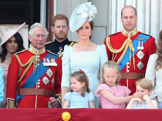 Meghan and Harry watch the flypast on the balcony of Buckingham Palace during Trooping The Colour in 2018. They did not look happy. Picture: Getty Images