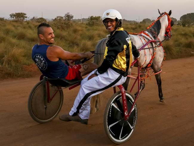 Charles "do Bronx" Oliveira (R) and his master Jorge Patino 'Macaco' ride one of his horses. Picture: Buda Mendes/Getty Images