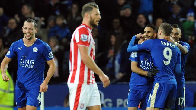 Leicester players Daniel Drinkwater, left, Riyad Mahrez, Jamie Vardy, Danny Simpson, right, celebrate after Leicester’s Leonardo Ulloa scored against Stoke during the English Premier League soccer match between Leicester City and Stoke City at the King Power Stadium in Leicester, England, Saturday, Jan. 23, 2016. (AP Photo/Rui Vieira)