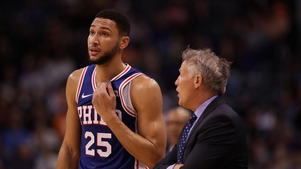PHOENIX, ARIZONA - NOVEMBER 04: Ben Simmons #25 of the Philadelphia 76ers talks with head coach Brett Brown during the first half of the NBA game against the Phoenix Suns at Talking Stick Resort Arena on November 04, 2019 in Phoenix, Arizona. NOTE TO USER: User expressly acknowledges and agrees that, by downloading and/or using this photograph, user is consenting to the terms and conditions of the Getty Images License Agreement Christian Petersen/Getty Images/AFP == FOR NEWSPAPERS, INTERNET, TELCOS &amp; TELEVISION USE ONLY ==