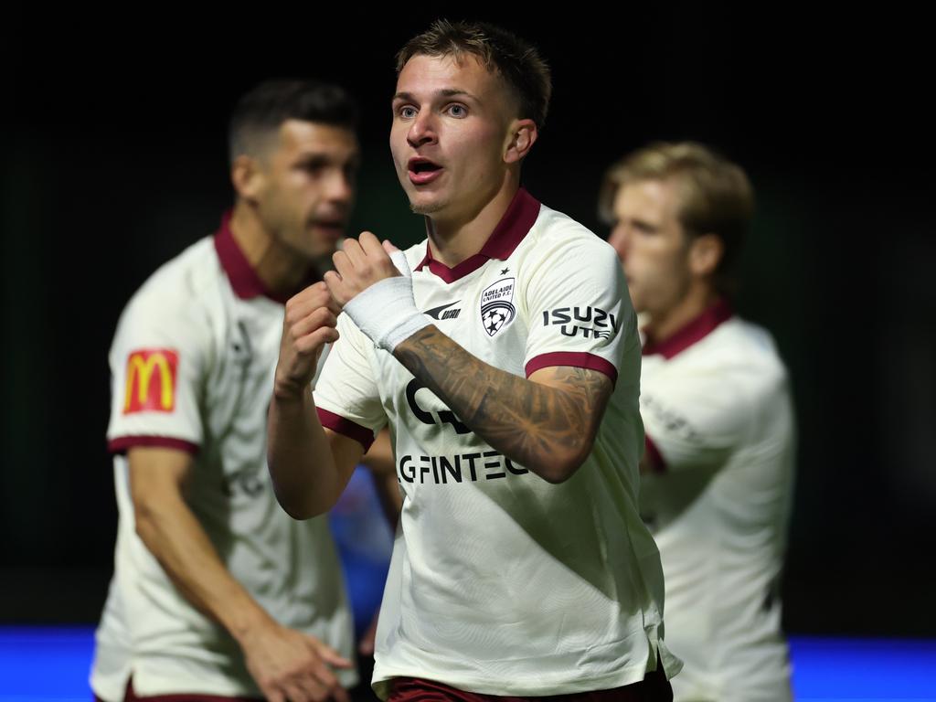 Luka Jovanovic celebrates his early goal for Adelaide United. Picture: Getty Images