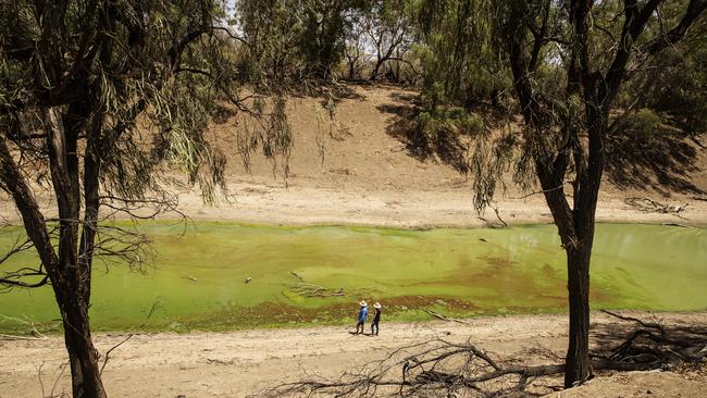 Chrissy and Bill Ashby on the banks of the Darling River near their property Trevallyn Station in Tilpa, far west NSW.