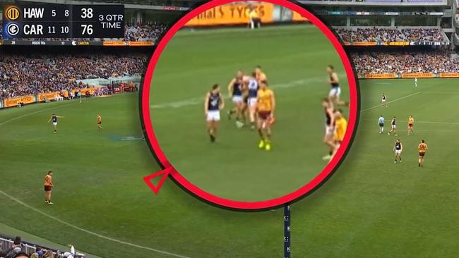 Jacob Weitering’s hit off the ball on Hawk Lloyd Meek. Picture: Fox Footy