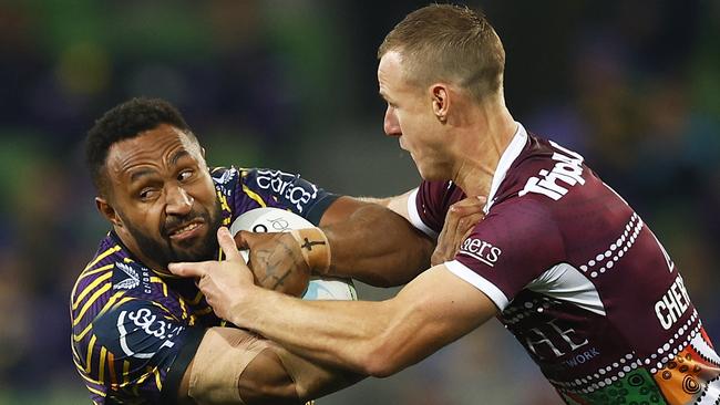 Justin Olam (L) has re-signed with the Storm. Picture: Daniel Pockett/Getty