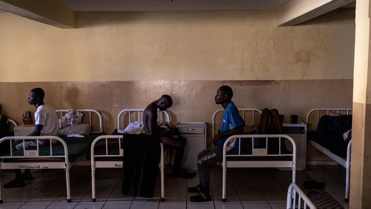 Recovering Kush addicts sit on their beds at the Kissy Mental Hospital in Freetown on June 22, 2023. Picture: John Wessels / AFP