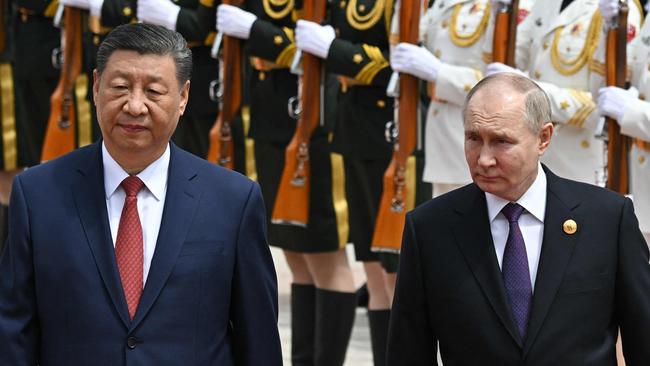 China's President Xi Jinping, left, describes his Russian counterpart Vladimir Putin as ‘my best, most intimate friend’. Picture: AFP