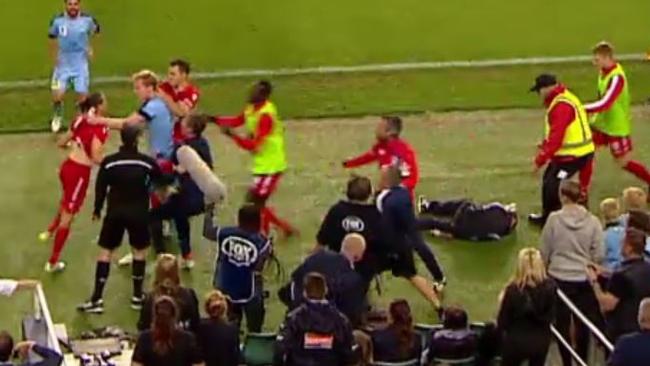 A still of the melee that disrupted play after the ball boy went to ground in the FFA Cup final. Picture: FOXSPORTS