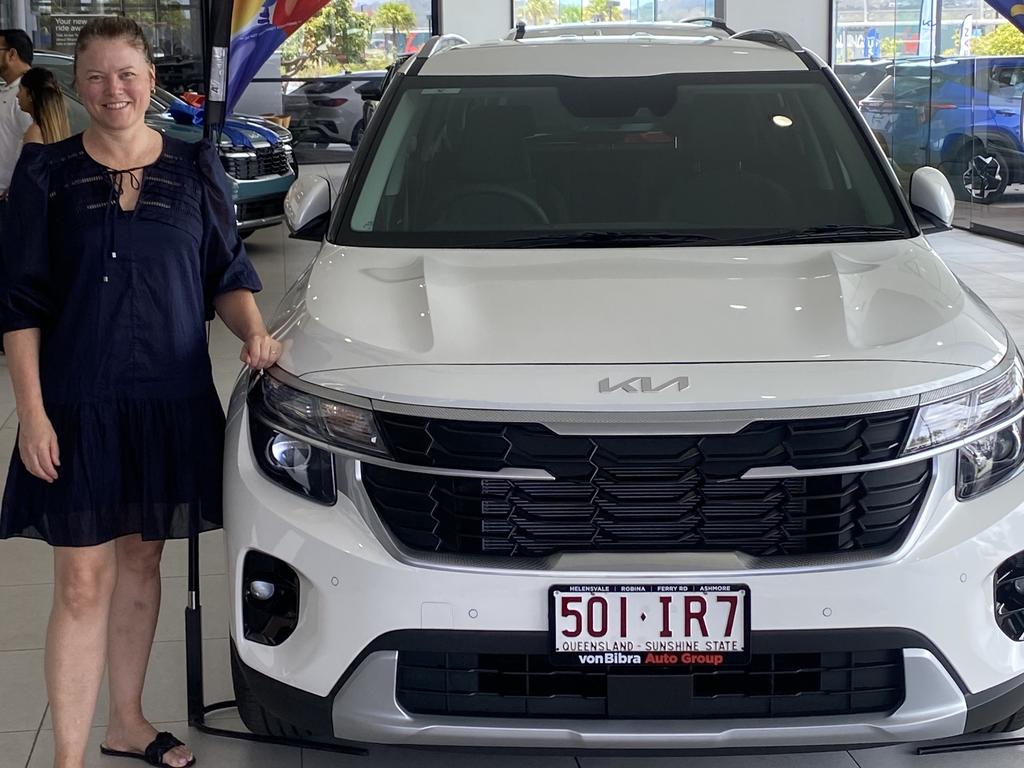 Nadine Broadbent when she collected the couple’s brand new Kia, which was stolen in August. Picture: Supplied.