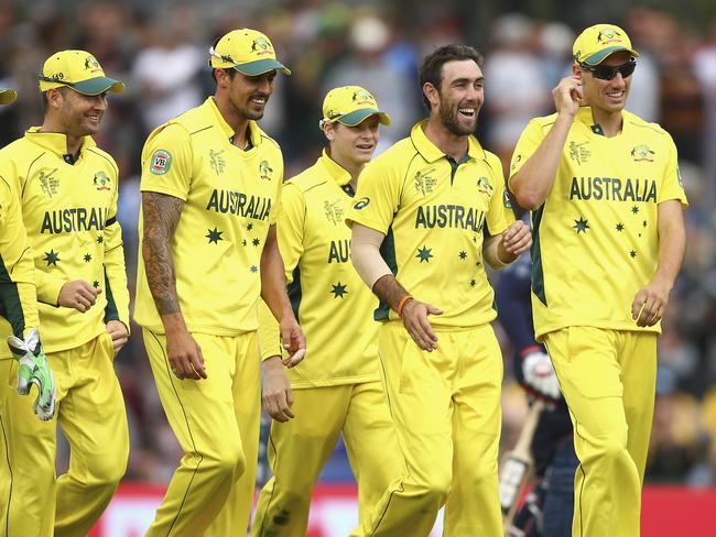 Australia celebrates after Maxwell takes a wicket against Scotland.