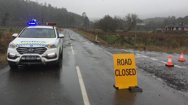 A police car at Myrtle Park, about half way between Launceston and Scottsdale, where the body of a man believed to be missing person Jake Anderson-Brettner has been found. Picture: NICK CLARK