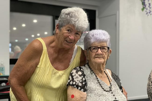 Irene Windsor (left) stands with her mother Vi Martin at the Sarina Country Music Family Afternoon. Mrs Martin will turn 96 in April. Picture: Duncan Evans