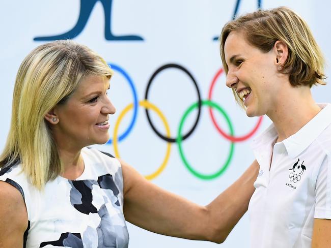 ADELAIDE, AUSTRALIA - APRIL 14: Kitty Chiller the Chef de Mission presents Bronte Campbell with her boarding pass to the Rio Olympics during the 2016 Australian Swimming Championships at the South Australia Leisure & Aquatic Centre on April 14, 2016 in Adelaide, Australia. (Photo by Quinn Rooney/Getty Images)