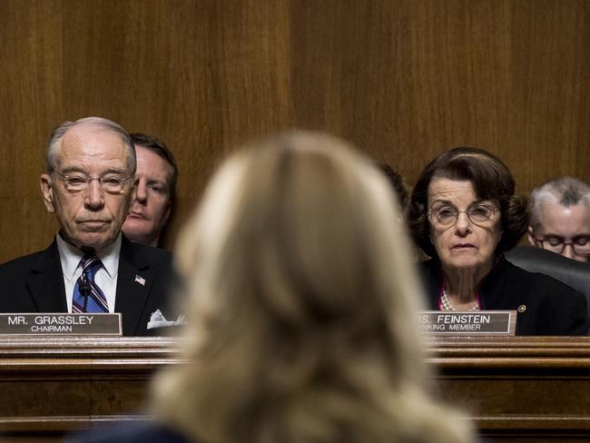 From left, Sen. Chuck Grassley, R-Iowa, Sen. Dianne Feinstein, D-Calif., and Sen. Patrick Leahy, D-Vt., listen as Christine Blasey Ford testifies before the Senate Judiciary Committee, Thursday, Sept, 27, 2018 on Capitol Hill in Washington.  (Tom Williams/Pool Image via AP)