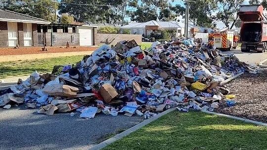 The street was littered with a huge pile of rubbish. Picture: Facebook