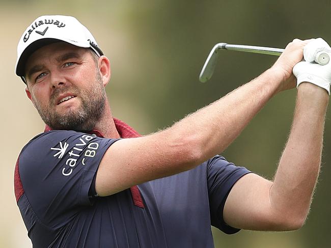 SYDNEY, AUSTRALIA - DECEMBER 08: Marc Leishman of Australia plays his approach shot on the 1st hole during day four of the 2019 Australian Golf Open at The Australian Golf Club on December 08, 2019 in Sydney, Australia. (Photo by Mark Metcalfe/Getty Images)