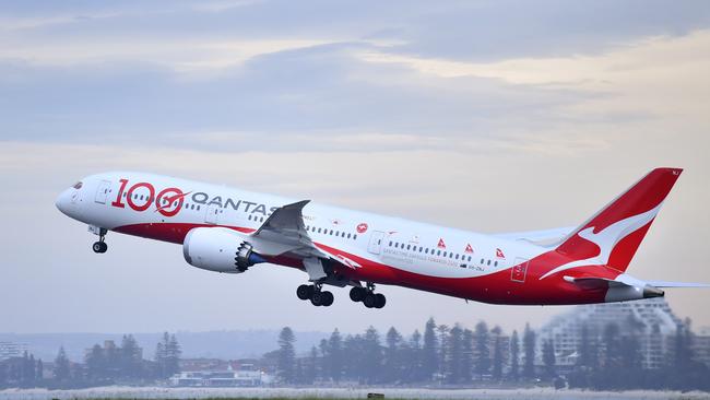 A Qantas Boeing 787 takes off from Sydney Airport. The airline is being sued by a customer who believes Qantas should’ve picked up the tab for extra flights he had to book when his return journey was delayed by 12-days. Picture: Getty Images