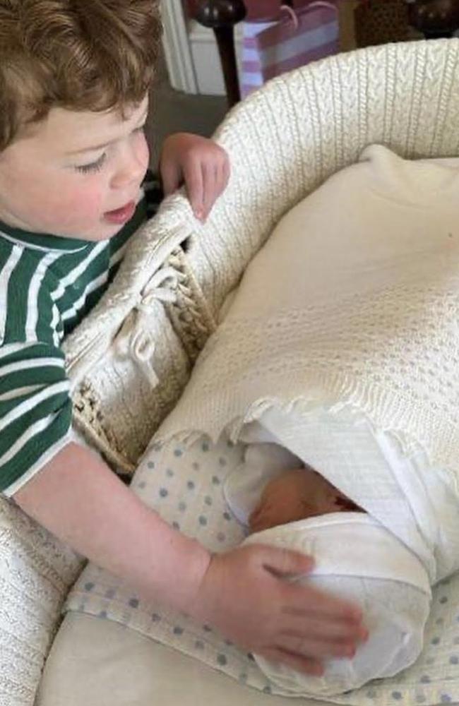 Princess Eugenie and Jack Brooksbank’s first son August pats the head of Ernest. Picture: Instagram.