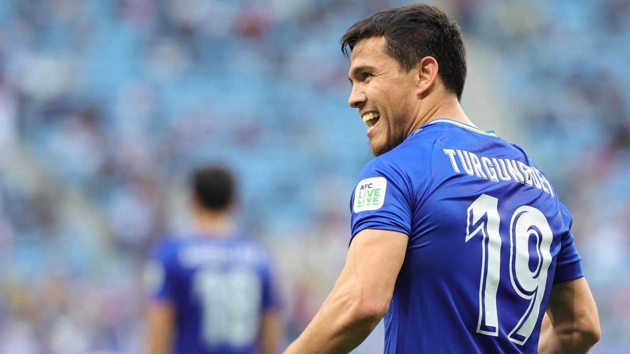 Azizbek Turgunboev celebrates his goal. Picture: AFP