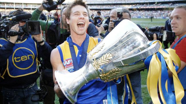 Ben Cousins celebrates with the premiership cup.