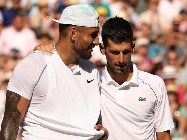 Novak Djokovic (right) and Nick Kyrgios embrace after the men’s singles final at Wimbledon. Picture: Getty Images