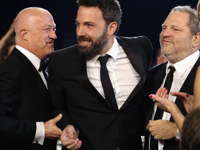 L-R) Co-Chairman of Creative Artists Agency Bryan Lourd, director Ben Affleck and co-chairmen of The Weinstein Company Harvey Weinstein. Picture: AFP