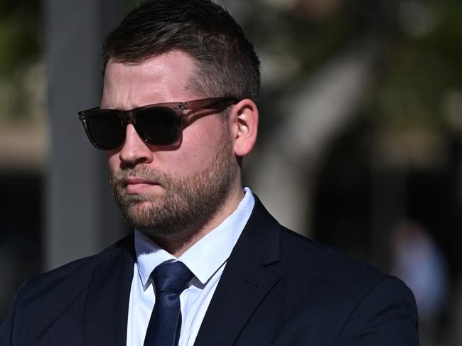 BRISBANE, AUSTRALIA - NewsWire Photos - JUNE 18, 2024.Detective Senior Constable Zac Aaron Chudleigh leaves the District Court in Brisbane. The 29-year-old is facing one charge of stealing by persons in the public service and one charge of fraud - dishonestly obtaining property to the value of at least $30,000 but less than $100,000. The alleged stealing occurred between March and September 2022 and involved three luxury watches that came into his possession through his employment, according to court documents.Picture: NewsWire*NO BYLINE PLS*