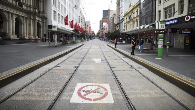 The Bourke Street Mall is almost empty during the morning peak on the first day of lockdown. Picture: NCA NewsWire / Andrew Henshaw