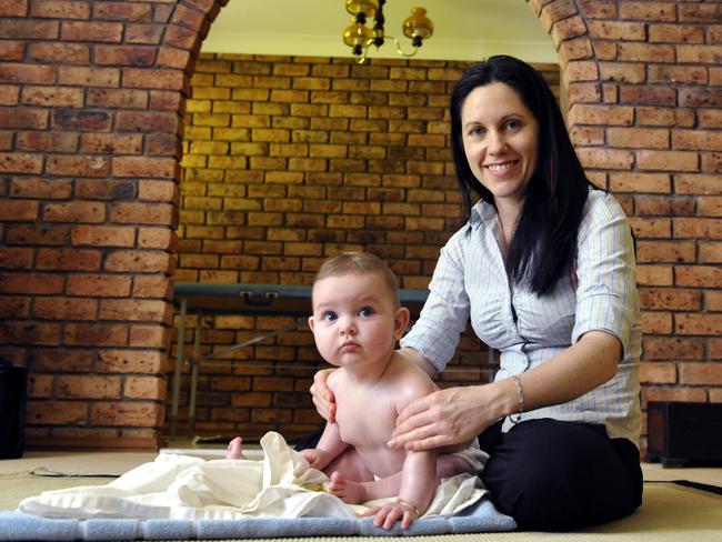 Heidi McLoughlin has a local infant massage business and thinks infant massage can ward off post natal depression. With Ella Justic., 7 months.