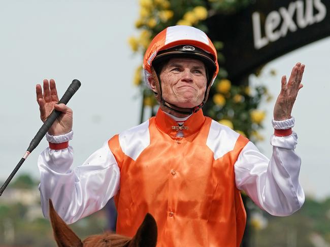 Jockey Craig Williams celebrates after riding Vow And Declare to victory in race 7, the Lexus Melbourne Cup, during Melbourne Cup Day, at Flemington Racecourse in Melbourne, Tuesday, November 5, 2019. (AAP Image/Scott Barbour) NO ARCHIVING, EDITORIAL USE ONLY