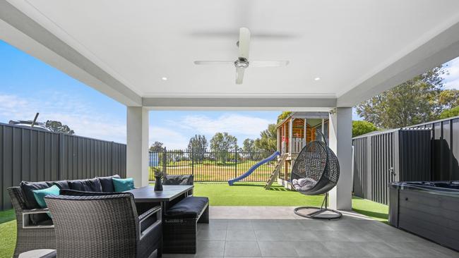 The alfresco area overlooking the rear yard. Supplied