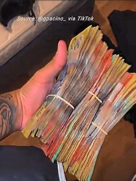 Gino Pacino with a wad of cash in a video on his social media. Picture: TikTok