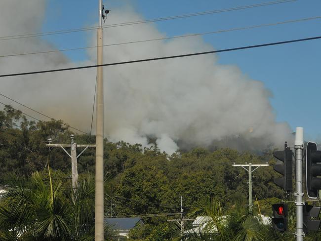 A dark column of smoke from back burning Radar Hill, Gladstone. Picture: CHRISSY HARRIS GLA_fire120610-1