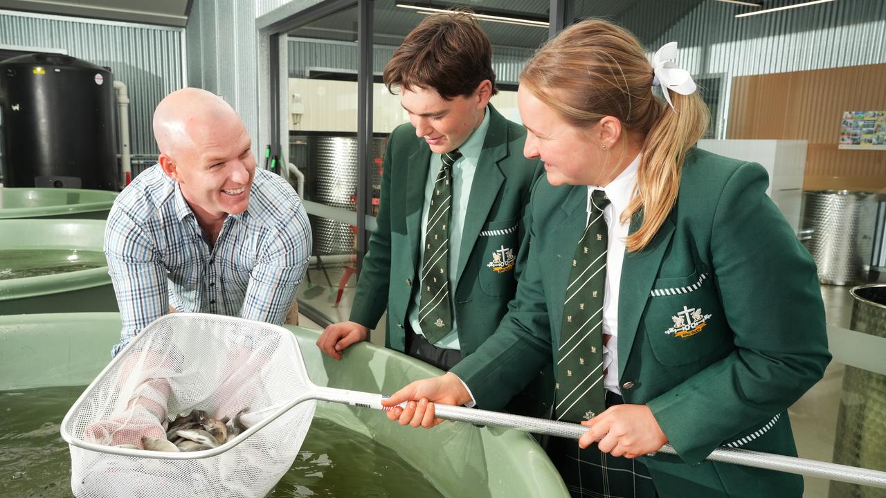 Head of agriculture at Westminster School, Andy Malcolm, checks out the new aquaculture facility with students Georgia and Brad. Picture: Dean Martin