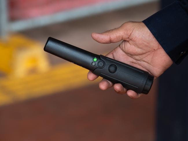 NT Police were using new wanding metal detectors at Palmerston bus interchange on Tuesday. Picture: Pema Tamang Pakhrin
