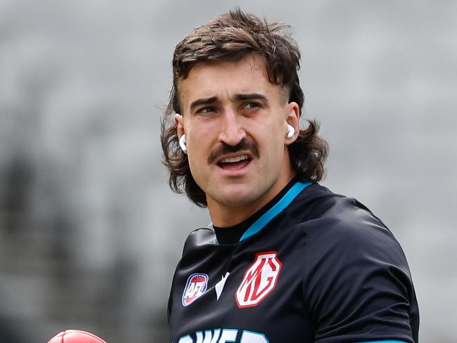 MELBOURNE, AUSTRALIA - APRIL 20: Ivan Soldo of the Power warms up before the 2024 AFL Round 06 match between the Collingwood Magpies and the Port Adelaide Power at the Melbourne Cricket Ground on April 20, 2024 in Melbourne, Australia. (Photo by Dylan Burns/AFL Photos via Getty Images)