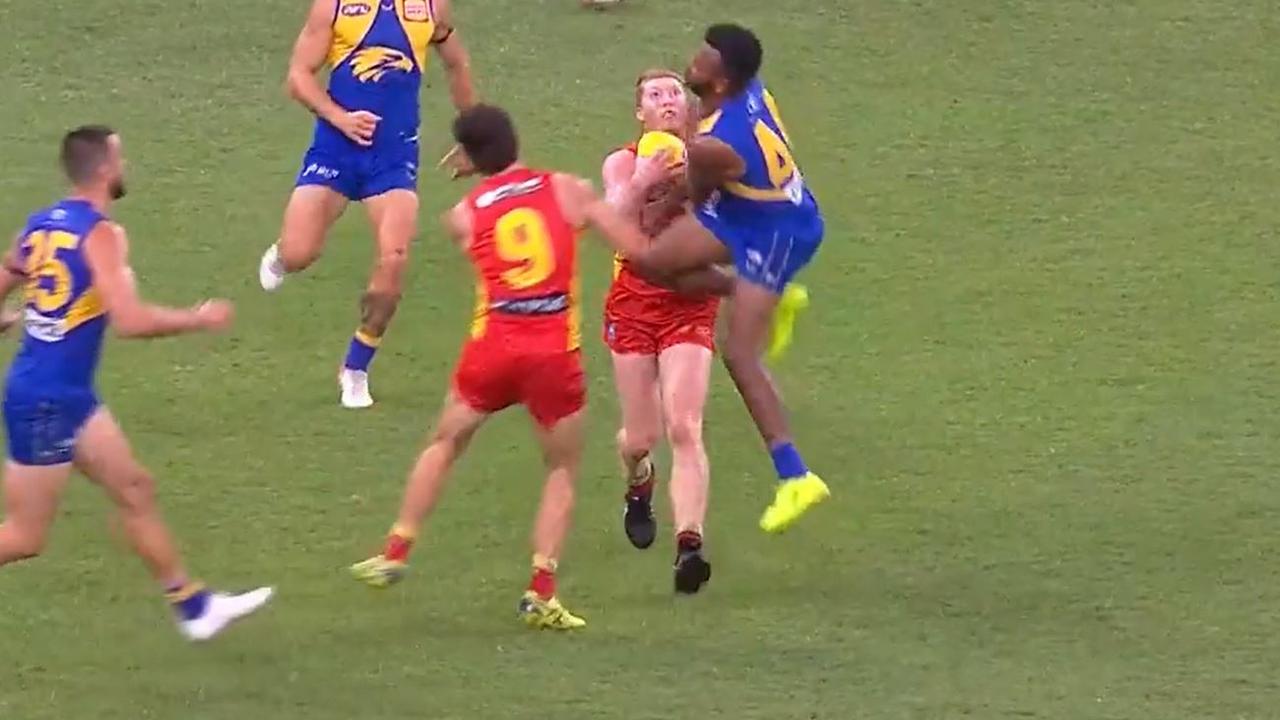 Matthew Rowell copped a heavy hit from Willie Rioli.