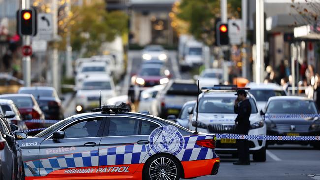 Police at the scene in Spring Street, Bondi Junction. Picture: Richard Dobson