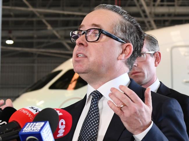 SYDNEY, AUSTRALIA - OCTOBER 22: Alan Joyce, CEO of Qantas talks to media at the Qantas Jetbase on October 22, 2021 in Sydney, Australia. Qantas announced today that all Australian-based Qantas and Jetstar employees will be able to return to work in December 2021. Qantas and Jetstar will resume international flights from 1 November 2021 as international passenger caps and quarantine requirements introduced in response to the global COVID-19 pandemic are removed. Additionally Qantas will launch a new route from Sydney to Delhi before Christmas and bring back two of its Airbus A380 aircraft earlier than planned to satisfy demand. (Photo by James D. Morgan/Getty Images)