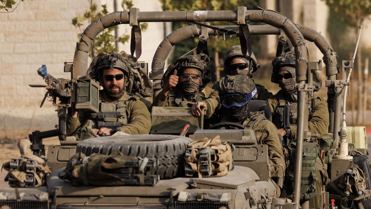 Israeli troops move near the border with Gaza. Picture: Getty