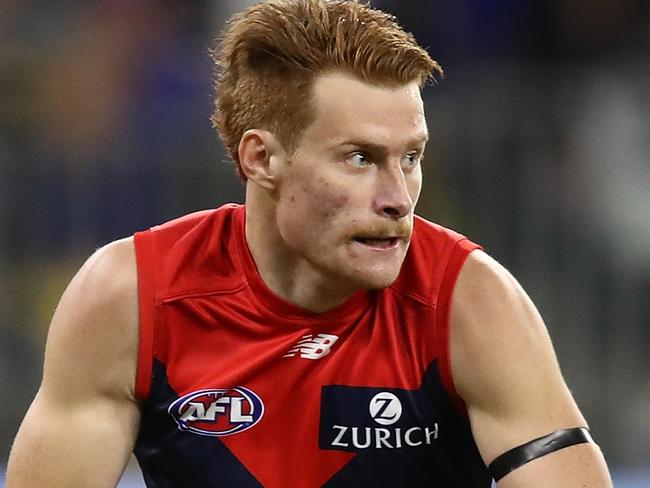 PERTH, AUSTRALIA - MAY 17: Oskar Baker of the Demons looks to pass the ball during the round nine AFL match between the West Coast Eagles and the Melbourne Demons at Optus Stadium on May 17, 2019 in Perth, Australia. (Photo by Paul Kane/Getty Images)