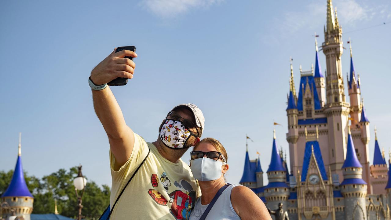 The theme park has updated its face mask policy which now explicitly warns people to stay in place and away from others if they remove their mask to eat. Picture: Matt Stroshane/Walt Disney World Resort.