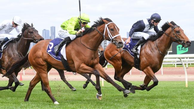 Stretan Angel races up to I Am Unstoppable before taking out the Group 2 Danehill Stakes at Flemington on Saturday. Picture: Pat Scala/Racing Photos via Getty Images