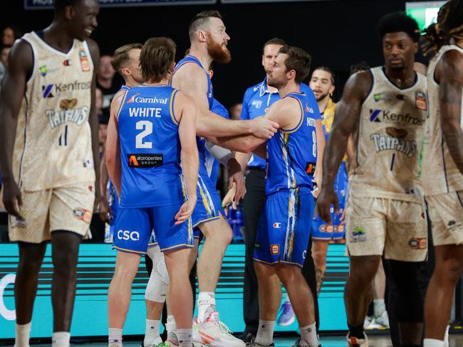 Aron Baynes had to be held back by teammates in a fiery exchange. Picture: Getty