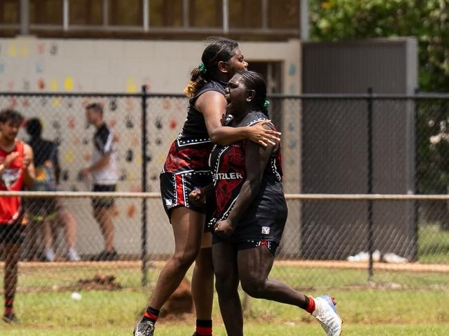 The Tiwi Bombers women celebrating in Round 9 of the 2024-25 NTFL season. Picture: Jack Riddiford / AFLNT Media