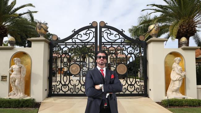 Candyman Travers Beynon at his Hope Island mansion. Picture: Glenn Hampson