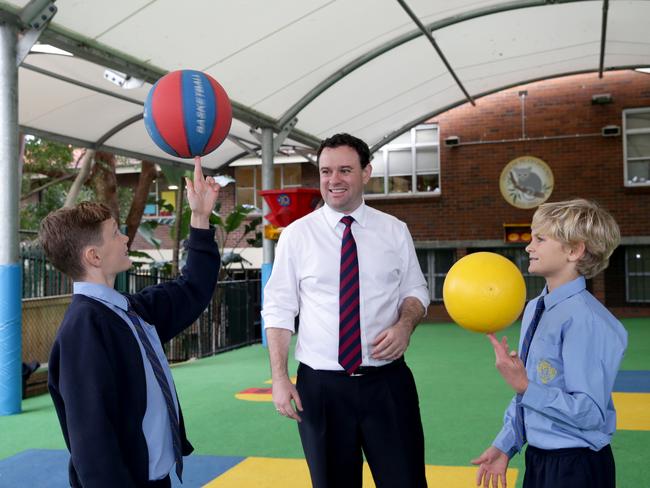 Stuart Ayres MP playing some basketball at St Anthony's School at Clovelly when he was Minister for Sport. Picture: Craig Wilson