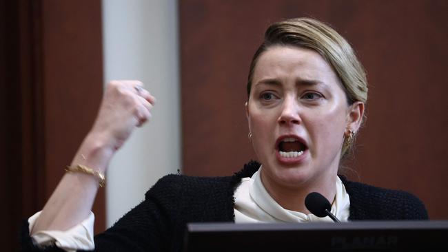 US actress Amber Heard testifies at the Fairfax County Circuit Courthouse. (Photo by Jim LO SCALZO / POOL / AFP)