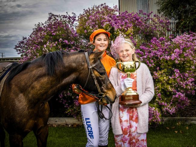 Schoolchildren Eva Coffey (and her horse Ruddy) and Zali Angle in Birchip.