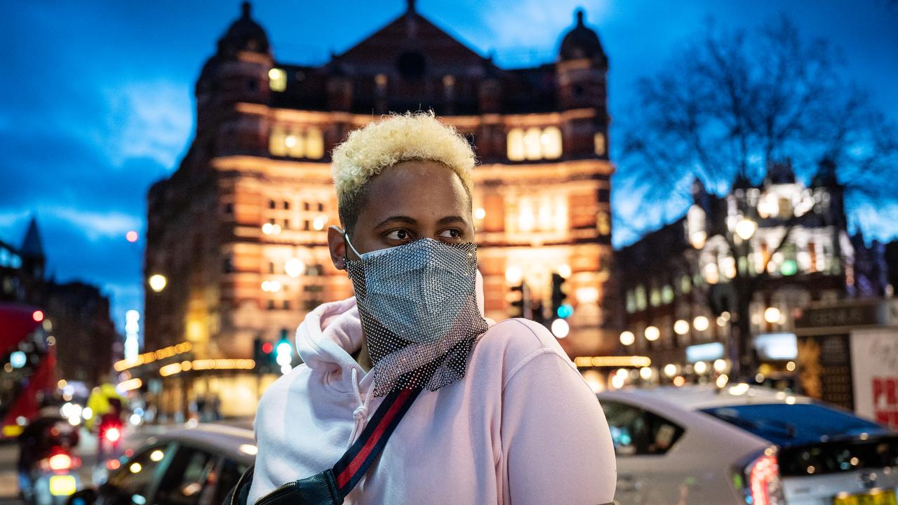 A tourist with a decorated surgical mask in the West End on March 17, 2020. Picture: Leon Neal/Getty Images