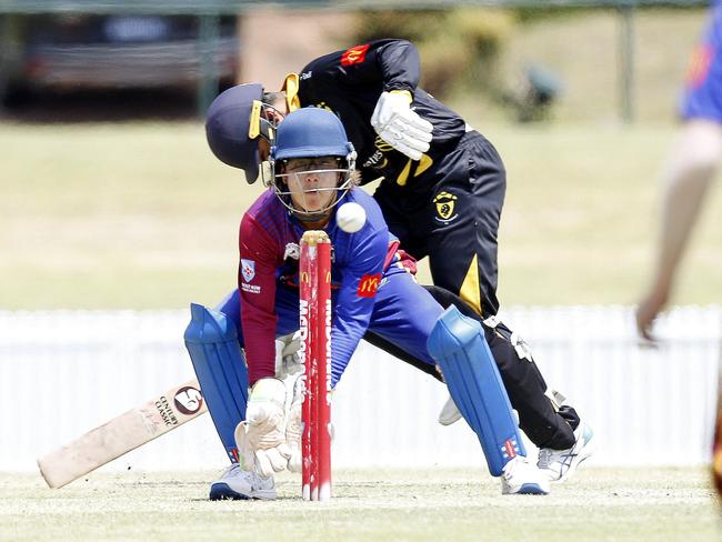 Northern District’s keeper Josh McDowell ready for the run out but Blacktown's Aarav Thakker is safe. Picture: John Appleyard